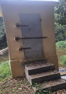 Concrete house protecting telemetry system. Solar panels mounted on the roof (Mauritius)