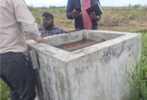 Steel-reinforced concrete borehole protection chamber