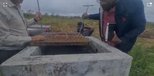 Removed steel plate cover granting access to the borehole and instruments