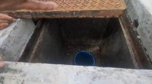 Removed steel plate cover granting access to the borehole and instruments